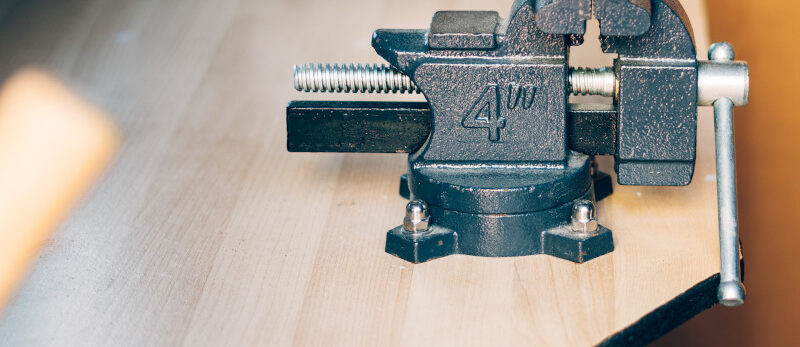 Bench vise. Metal clamps. Carpentry tools for fixing parts in various types of processing 2026 July Blog - Anchoring Equipment